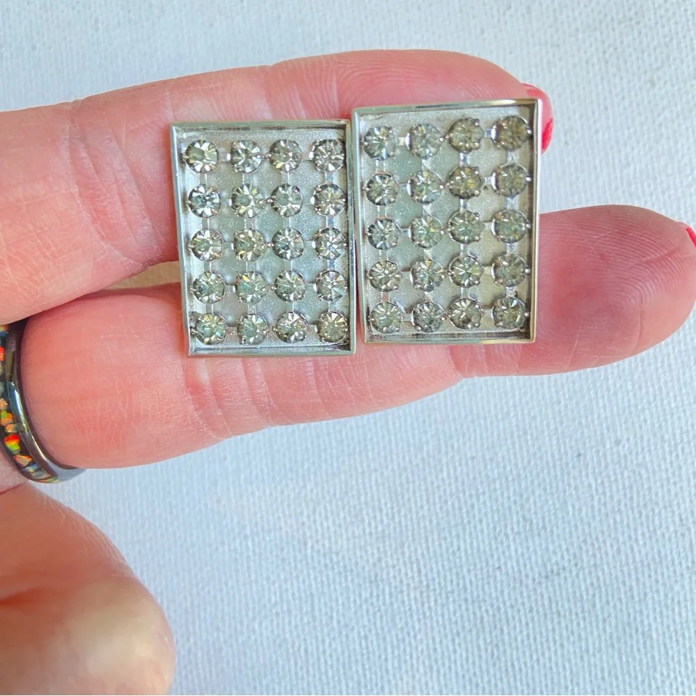 SWANK gray rhinestone cuff links in rectangular silvertone metal setting signed